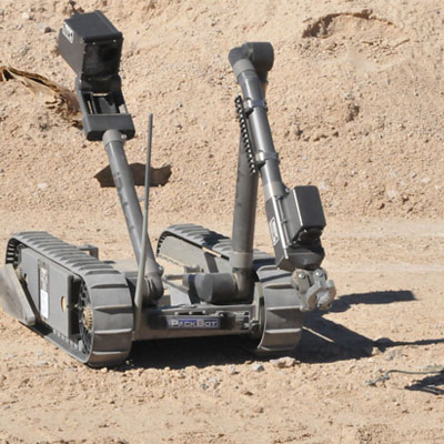 photo of irobot with tracks and arm